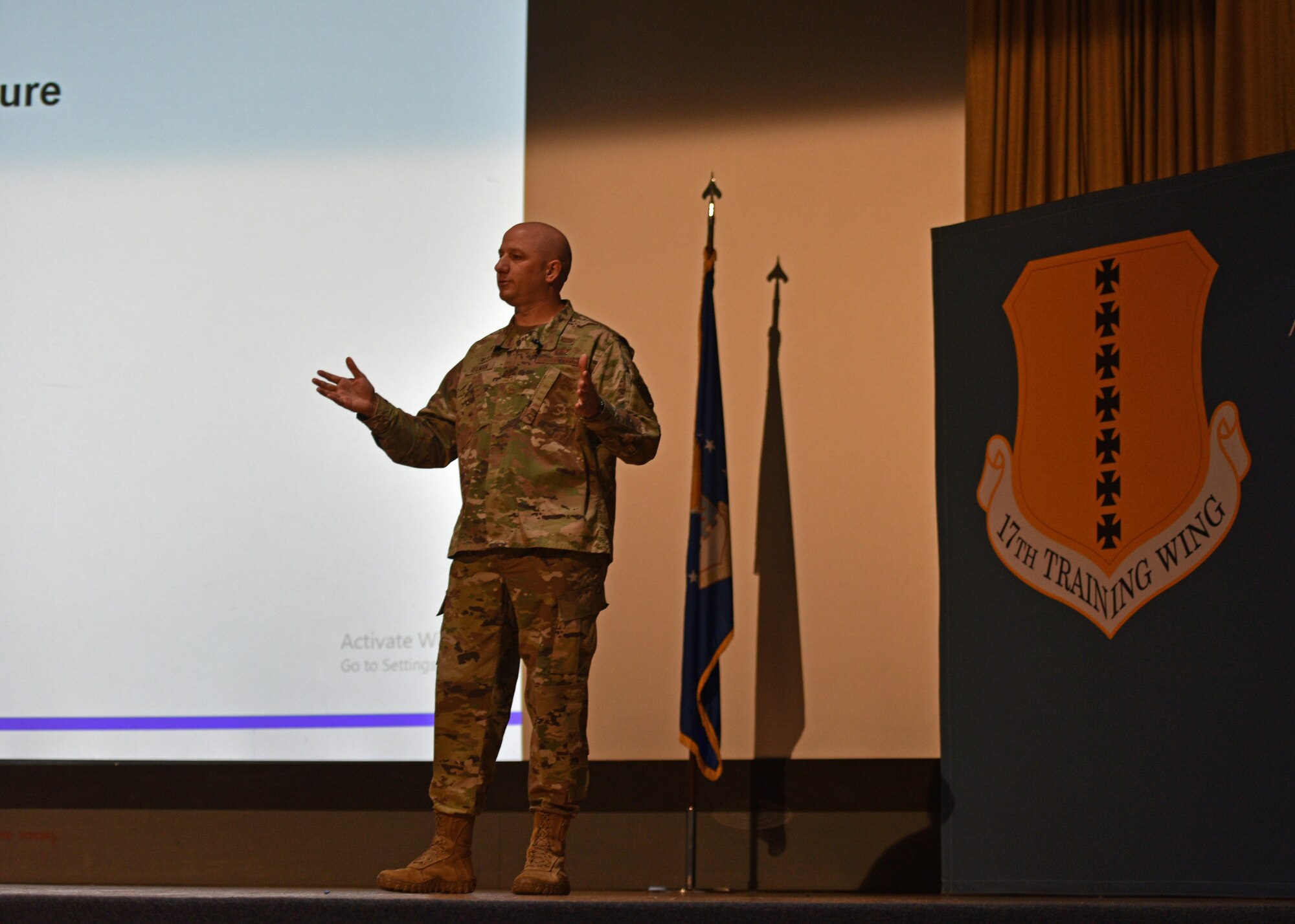 U.S. Air Force Col. Matthew Reilman, 17th Training Wing commander, speaks during the Commander’s Call on Goodfellow Air Force Base, Texas, Nov. 19, 2021. Reilman prioritized making Goodfellow a base of choice and plans for improving quality of life on installation. (U.S. Air Force photo by Senior Airman Ashley Thrash)