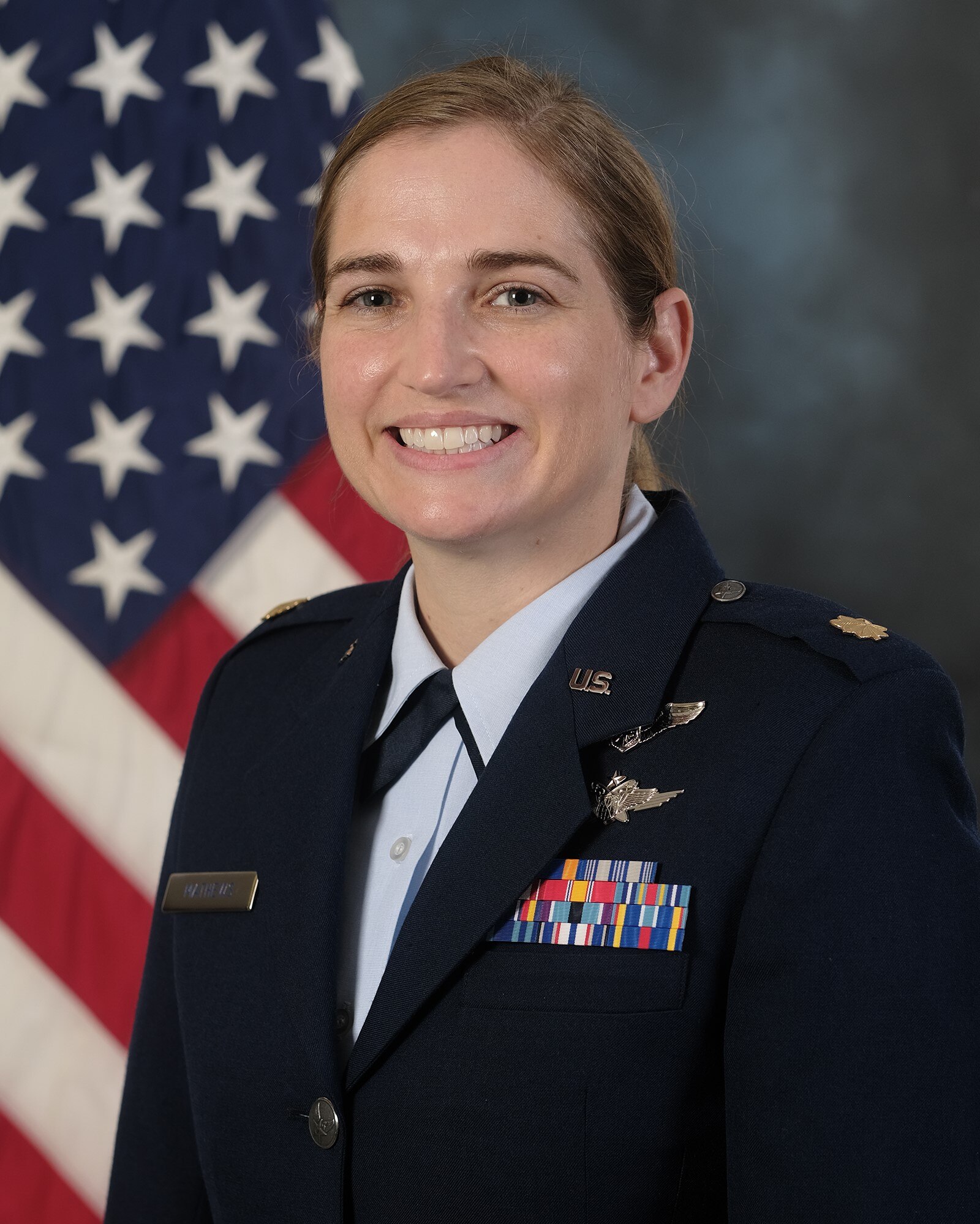 photo of Major Matthews with U.S. Flag in the background