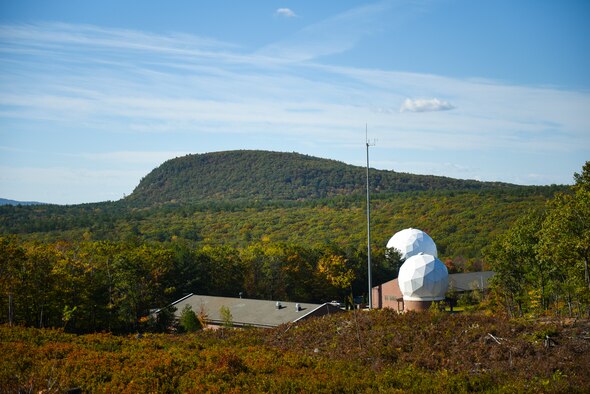 The Joe English Hill overlooks two radomes with newly replaced tracking systems that provide access to space and allows for the command and control, and health and safety of over 200 satellites a day at New Boston Space Force Station, New Hampshire.