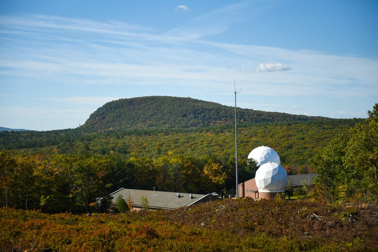 The Joe English Hill overlooks two radomes with newly replaced tracking systems that provide access to space and allows for the command and control, and health and safety of over 200 satellites a day at New Boston Space Force Station, New Hampshire.