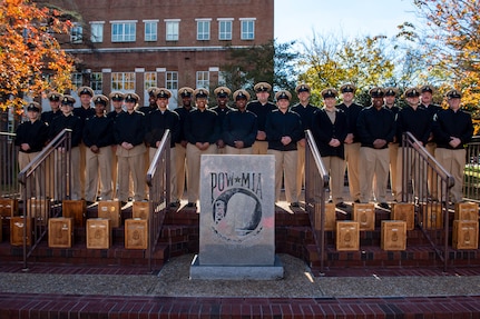 Newly pinned chief petty officers from Naval Support Activity Hampton Roads and tenant commands pose for a photo following the chief petty officer pinning ceremony at POW/MIA Park, Nov. 19, 2021.