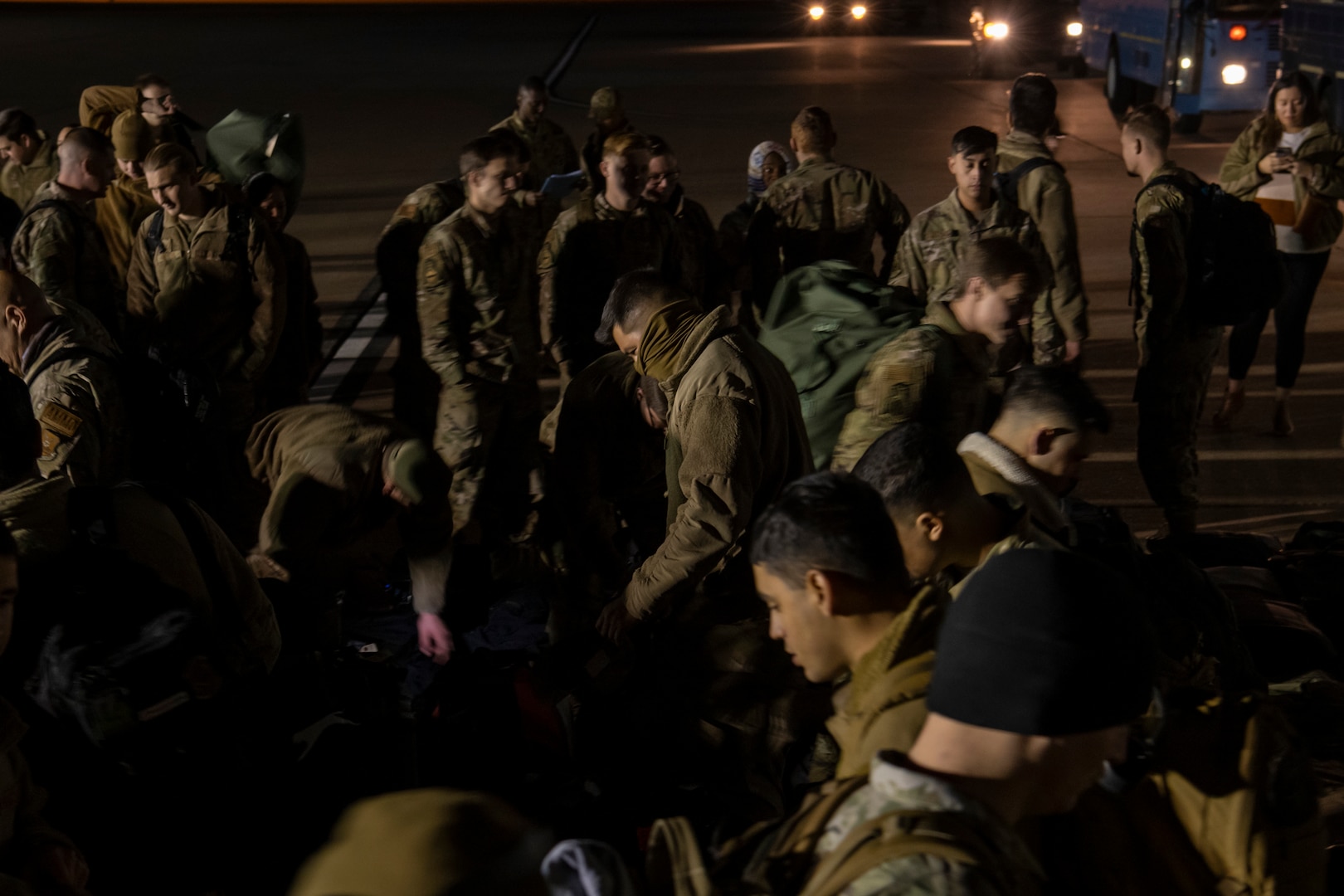 Airmen assigned to the 7th Bomb Wing look for their luggage after returning to Dyess Air Force Base, Texas, Nov. 18, 2021, from the Bomber Task Force Europe deployment.