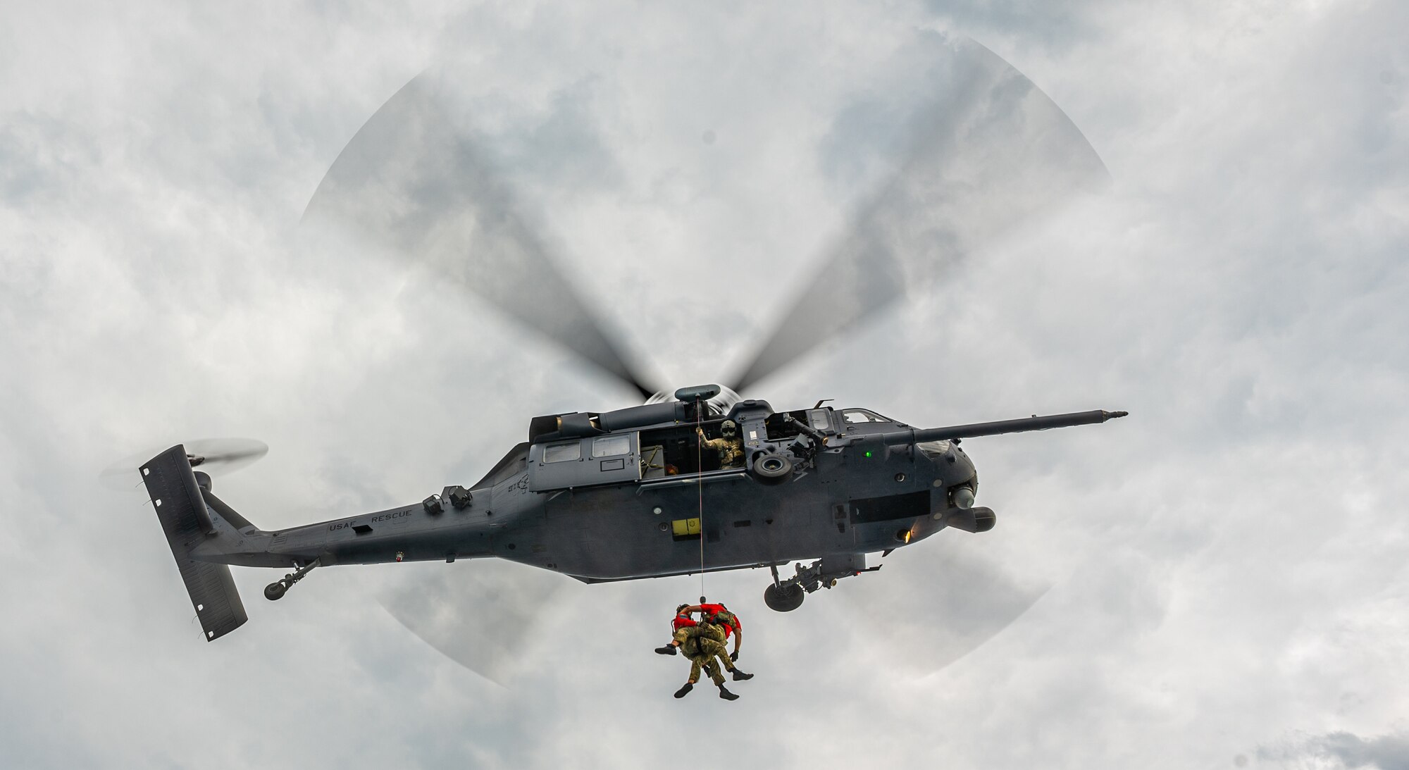 Airmen conduct hoist training.