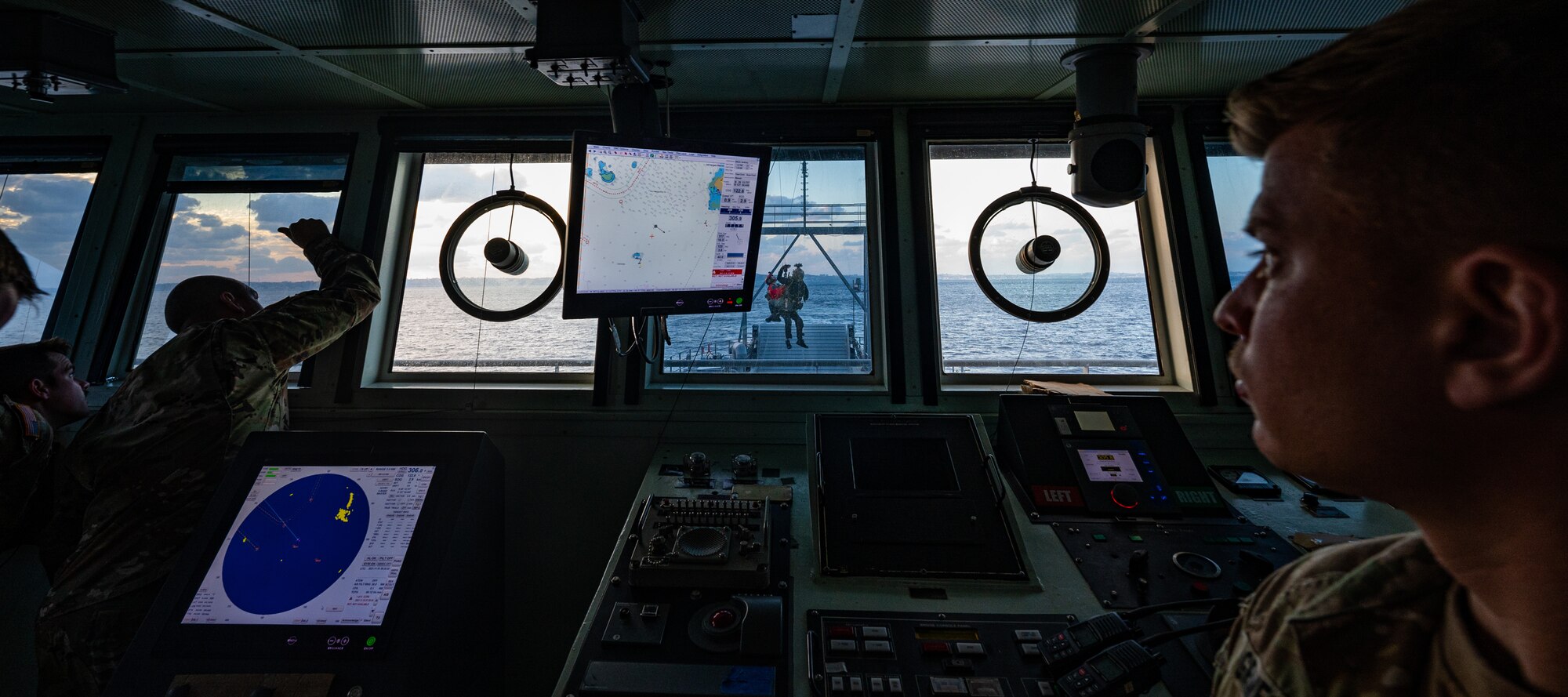 U.S. Soldiers observe hoist training.