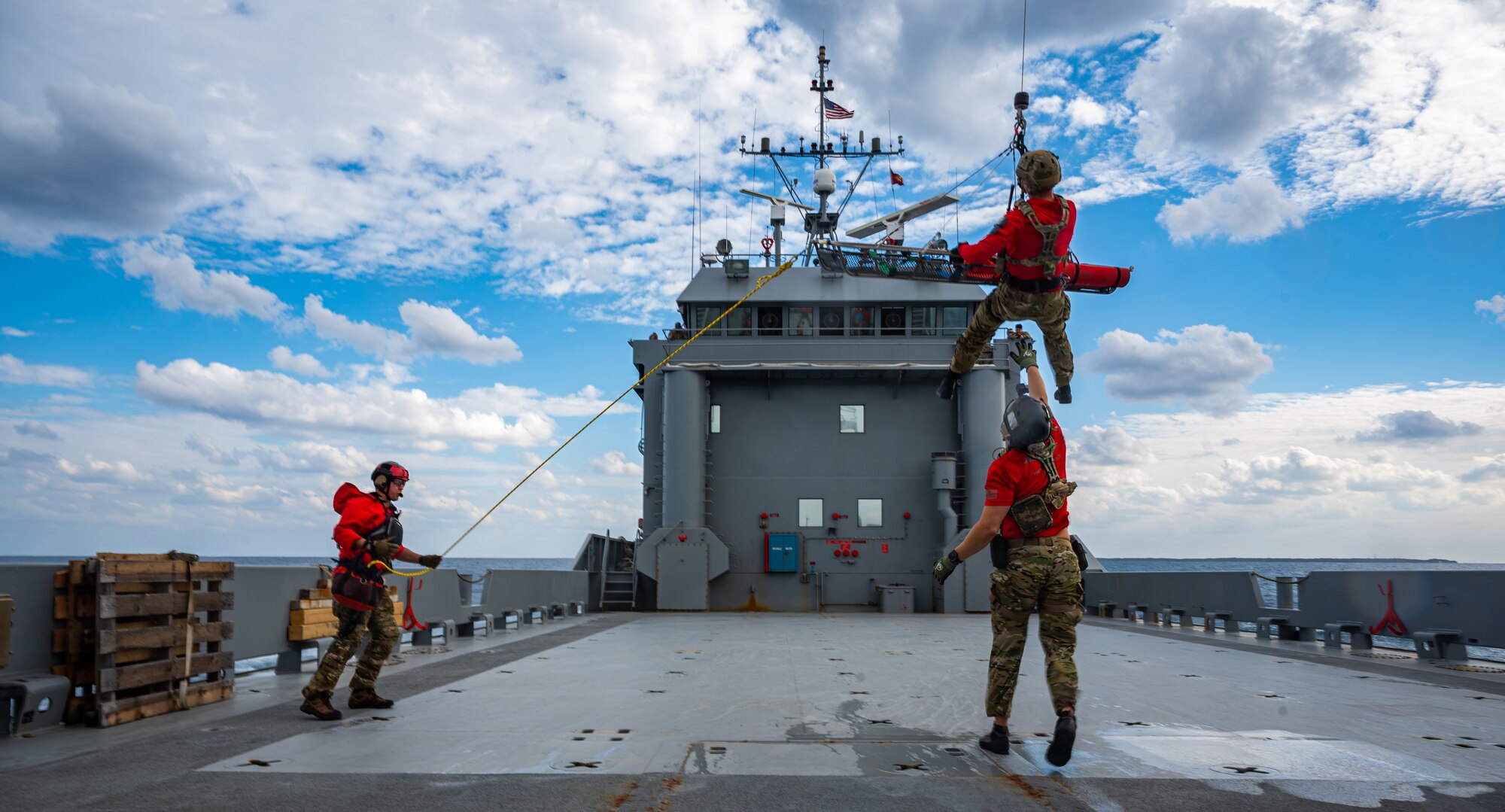 Airmen conduct hoist training.