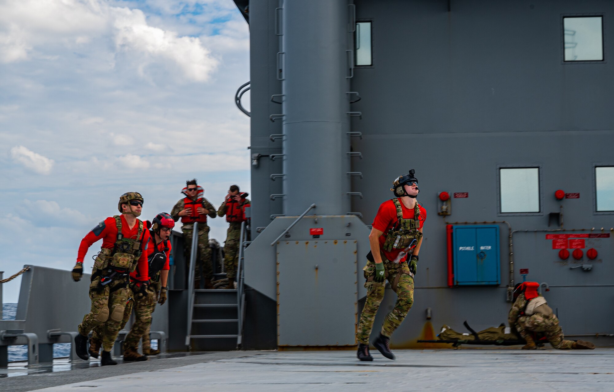 Airmen conduct hoist training.