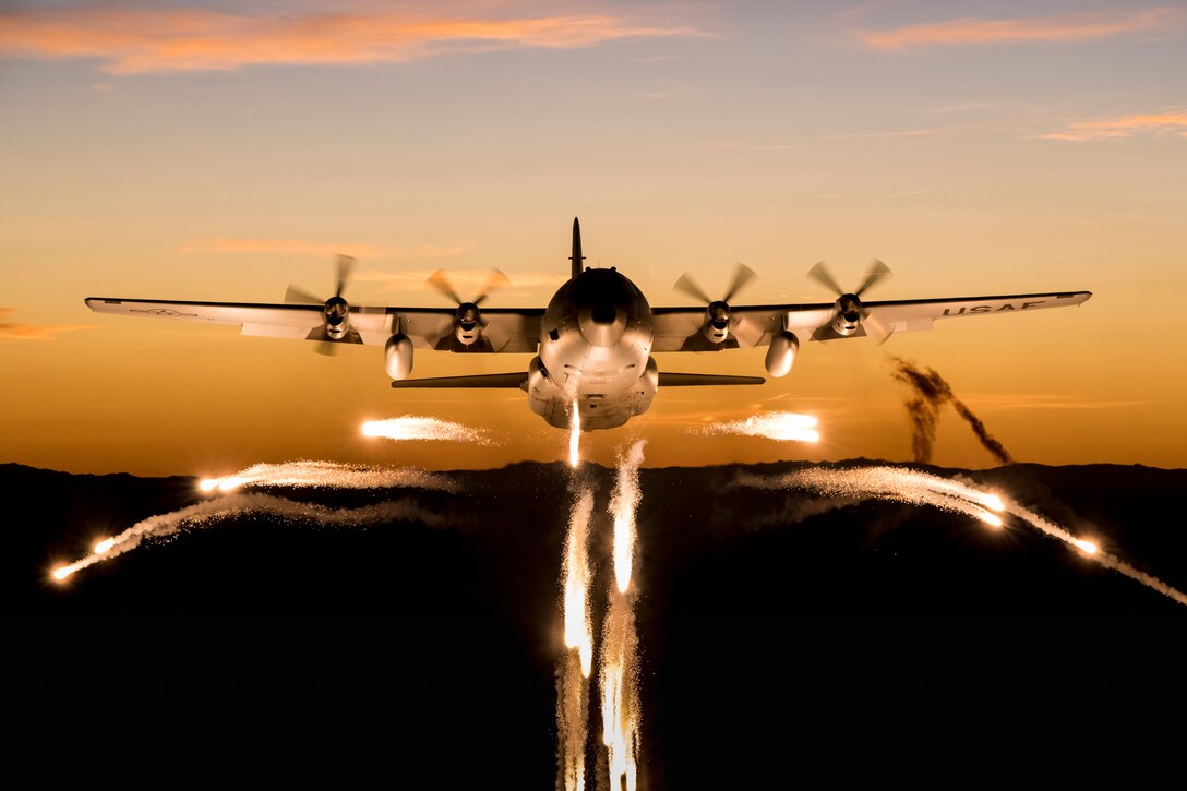 A C-130 Hercules fires off flares