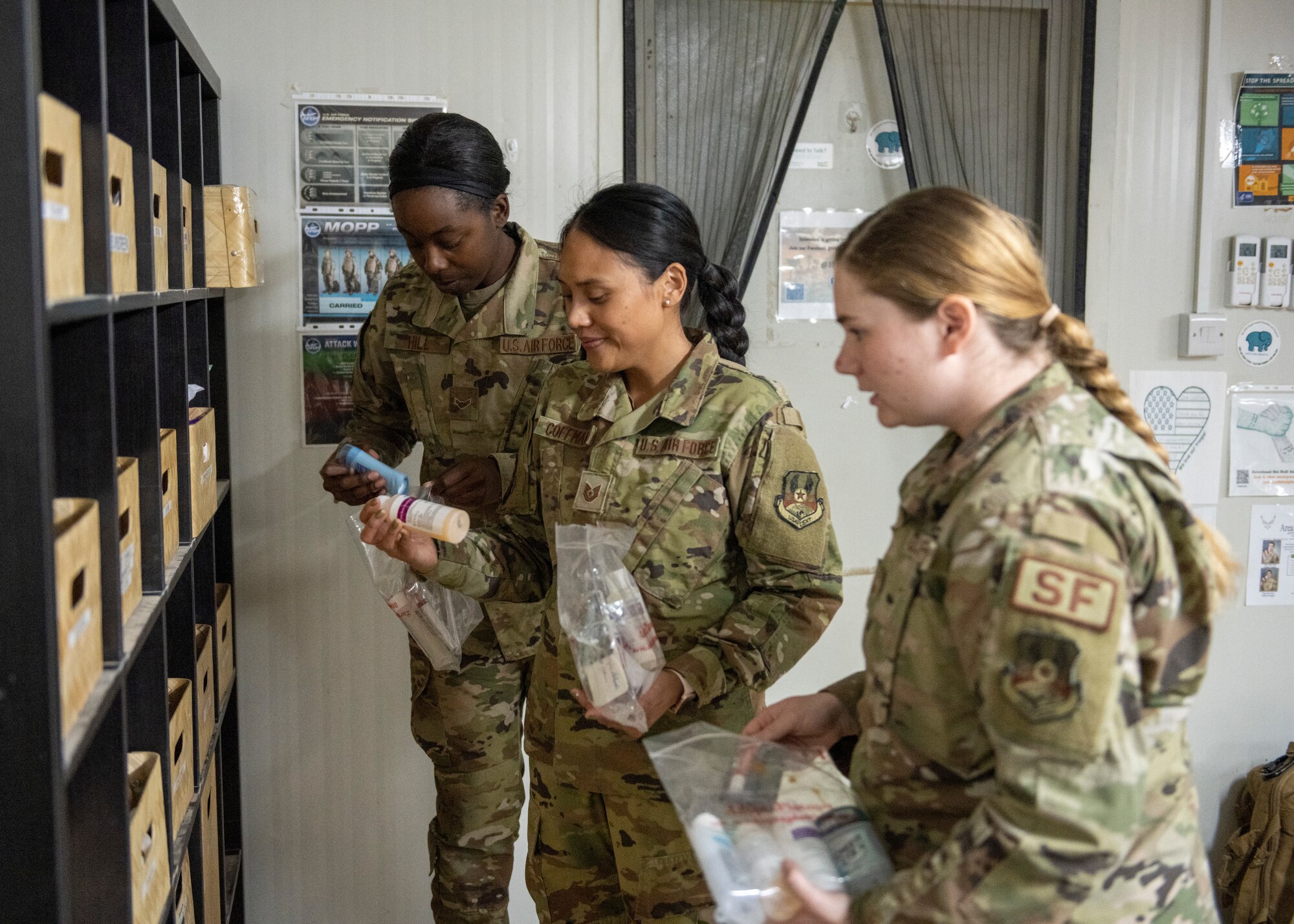 Airmen stock shelves