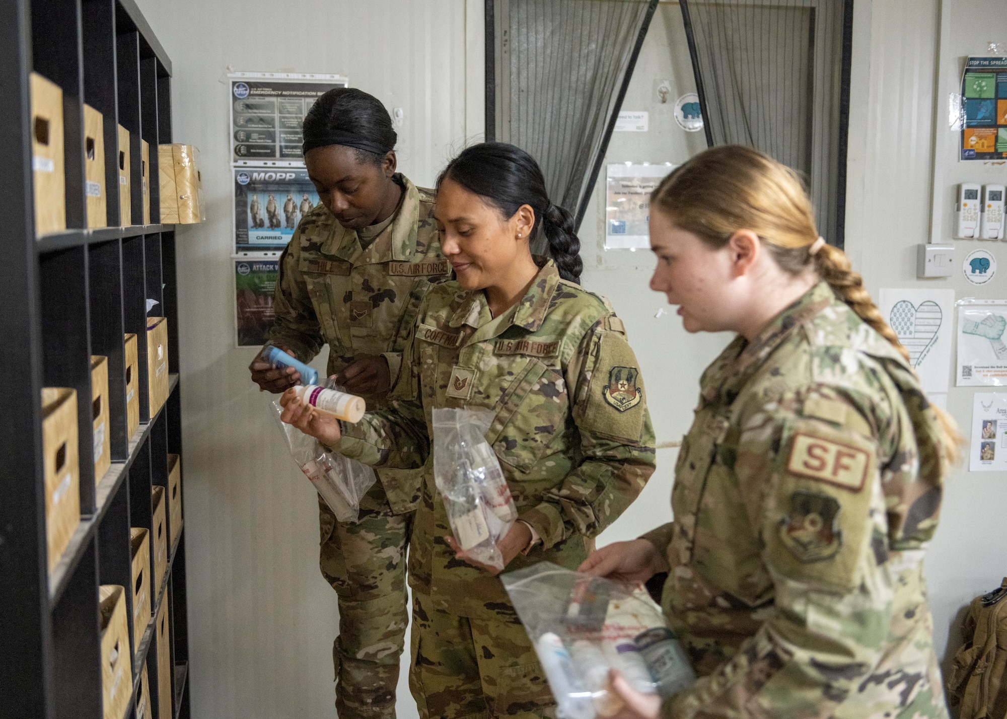 Airmen stock shelves