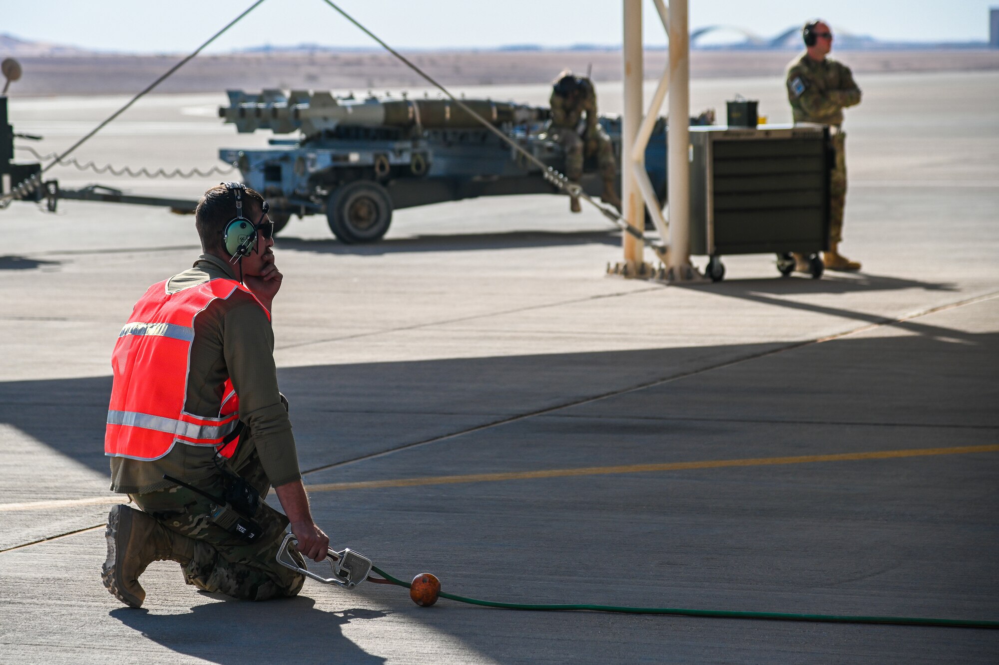 Tech. Sgt. Zechariah Postler, 176th Expeditionary Fighter Generation Squadron crew chief, participates in Integrated Combat Turn training at Prince Sultan Air Base, Kingdom of Saudi Arabia, Nov. 18, 2021. An ICT is the quick rearming and refueling of a running jet to reduce the aircrew’s time on the ground and increases the 176th Expeditionary Fighter Squadron’s ability to conduct and sustain combat operations. (U.S. Air Force photo by Staff Sgt. Christina Graves)