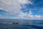 Members of U.S. Coast Guard Tactical Law Enforcement Detachment (LEDET) 102 and Sailors assigned to the “Sea Knights” of Helicopter Sea Combat Squadron (HSC) 22 participate in a drug interdiction aboard the Freedom-variant littoral combat ship USS Sioux City (LCS 11), Oct. 11, 2021.  Sioux City is deployed to the U.S. 4th Fleet area of operations to support Joint Interagency Task Force South’s mission in the Caribbean and Eastern Pacific. (U.S. Navy photo by Mass Communication Specialist 3rd Class Juel Foster/Released)