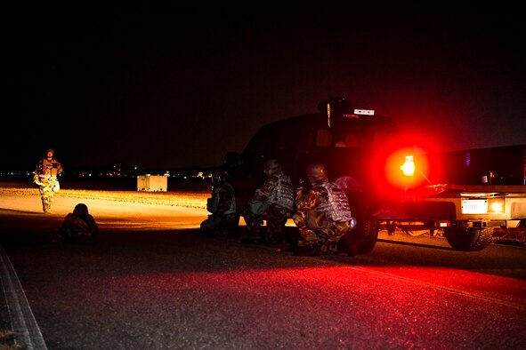 An Airmen observe Airmen during a tower bug-out.