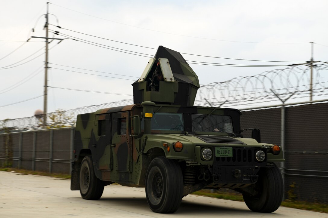 Eigth Security Forces Squadron defenders rush to a scene during a routine training event at Kunsan Air Base, Republic of Korea, Nov. 1, 2021. The Kunsan defenders are constantly training on their efficiency on base defense, leading to successfully locating and apprehending the simulated trespassers. (U.S. Air Force photo by Staff Sgt. Jesenia Landaverde)
