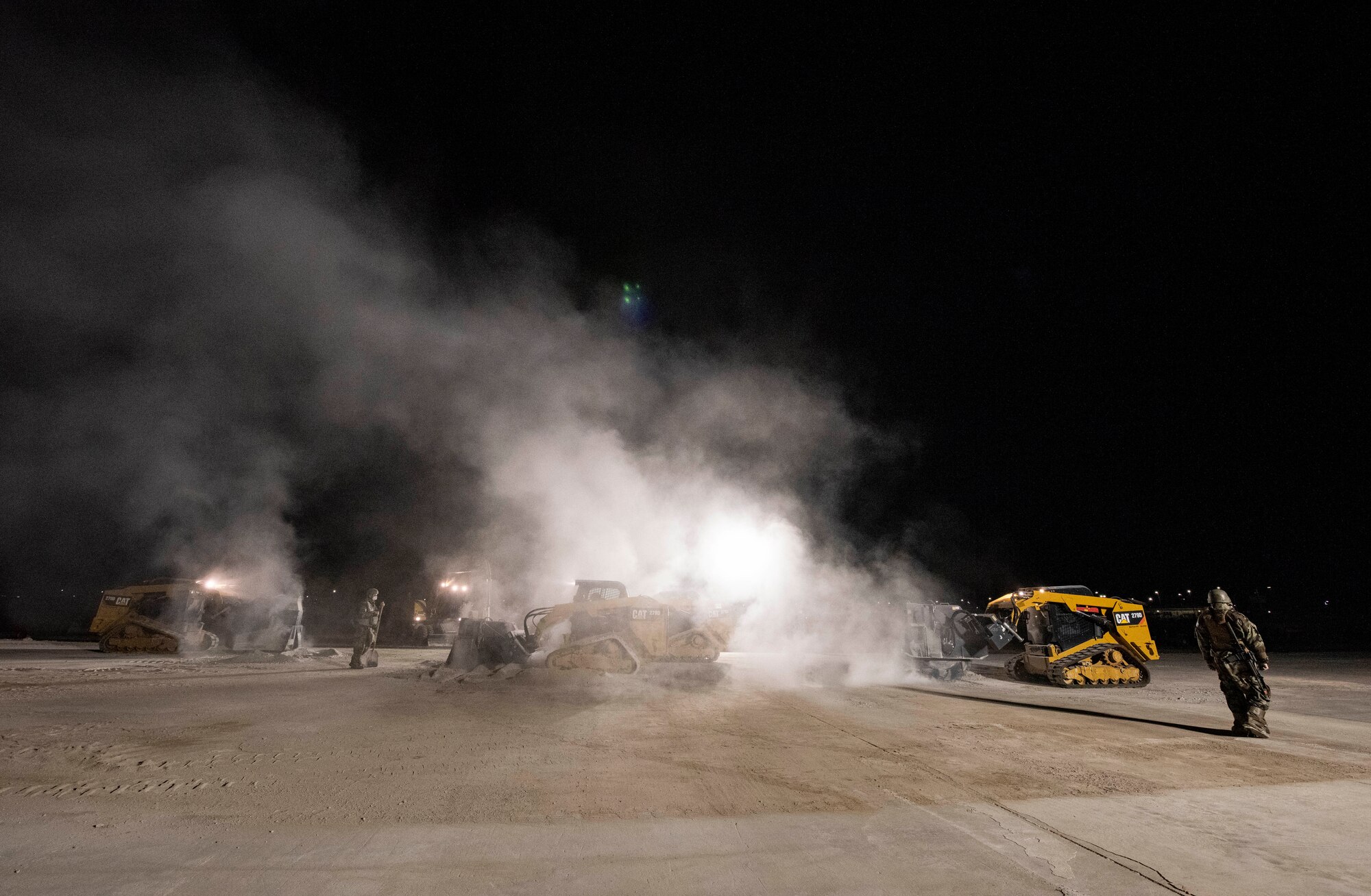 Airmen assigned to the 8th Civil Engineer Squadron prepare a simulated crater to be repaired during a Rapid Airfield Damage Repair routine training