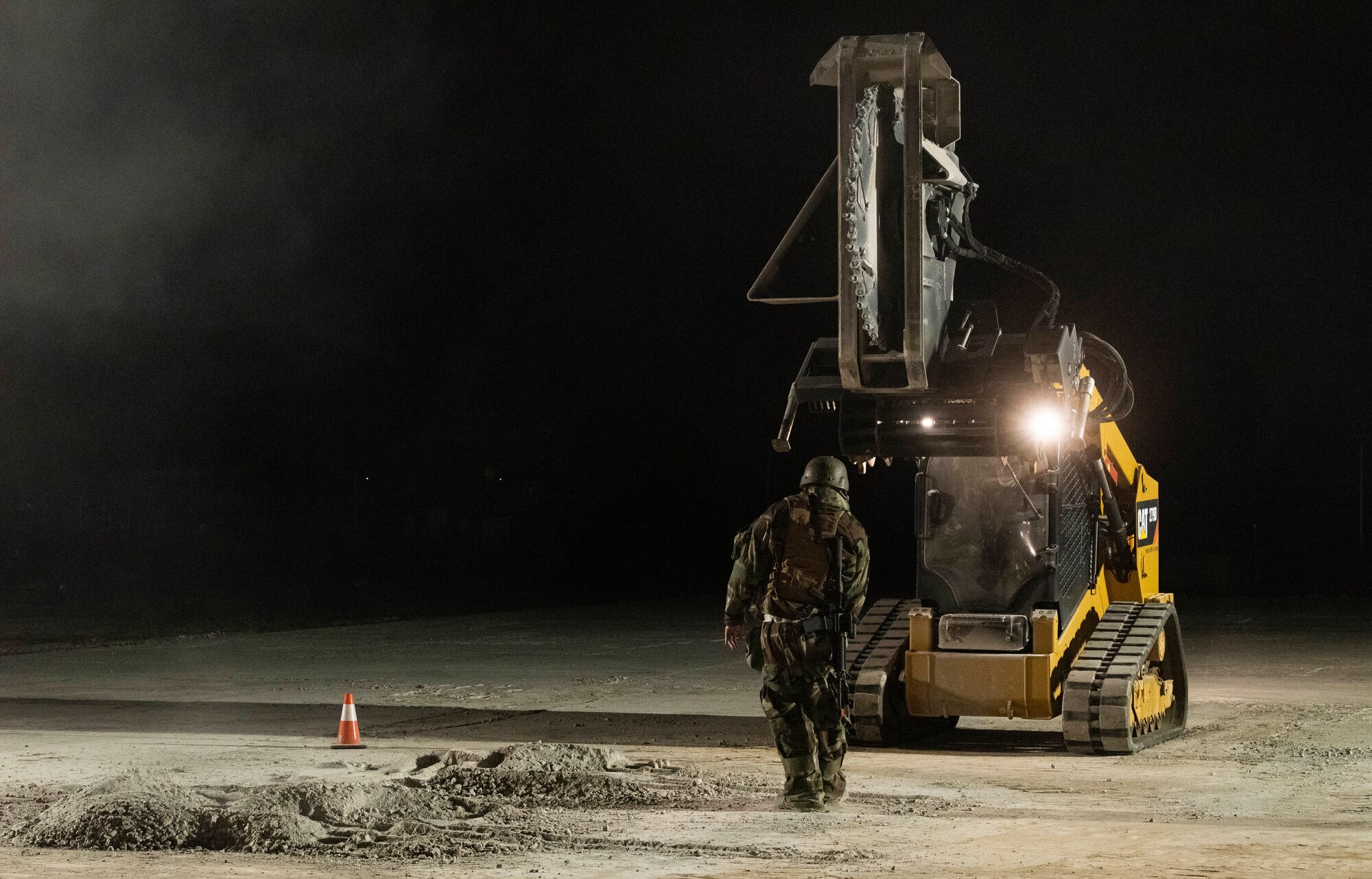 Airmen assigned to the 8th Civil Engineer Squadron prepare a simulated crater to be repaired during a Rapid Airfield Damage Repair routine training