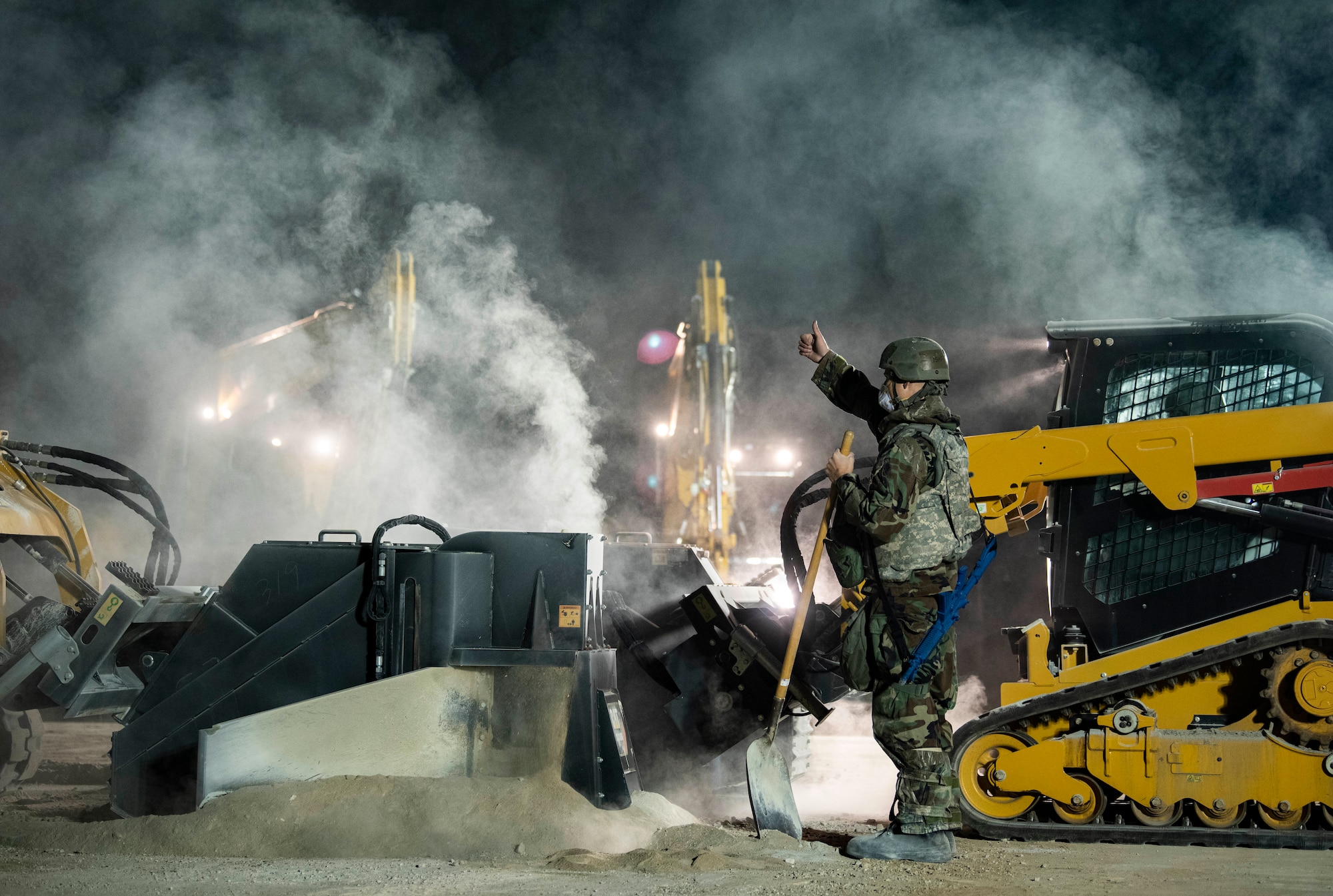 Airmen assigned to the 8th Civil Engineer Squadron prepare a simulated crater to be repaired during a Rapid Airfield Damage Repair routine training
