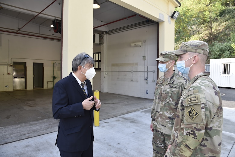 207th Military Intelligence Brigade (Theater) Brigade Engineer Leo Hargreaves discusses the construction program at Longare with U.S. Army Corps of Engineers, Europe District Commander Col. Pat Dagon and Project Engineer 1st Lt. Spencer Roehr during a visit to project sites at the installation October 4, 2021. The U.S. Army Corps of Engineers, Europe District is managing a $30 million construction and renovation program primarily funded by U.S. Army Intelligence and Security Command, U.S. Africa Command and U.S. Army Southern European Task Force, Africa to provide the 207th MIB(T) improved facilities at the Longare and Caserma Ederle portions of U.S. Army Garrison Italy. (U.S. Army photo by Chris Gardner)