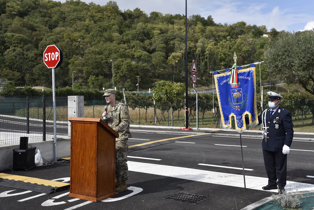 U.S. Army Corps of Engineers, Europe District Commander Col. Pat Dagon speaks at a ribbon cutting ceremony celebrating the completion of the Via Martinelli road improvement project just outside the Longare military installation on October 4, 2021. The U.S. Army Corps of Engineers, Europe District is managing a $30 million construction and renovation program primarily funded by U.S. Army Intelligence and Security Command, U.S. Africa Command and U.S. Army Southern European Task Force, Africa to provide the 207th MIB(T) improved facilities at the Longare and Caserma Ederle portions of U.S. Army Garrison Italy. (U.S. Army photo by Chris Gardner)