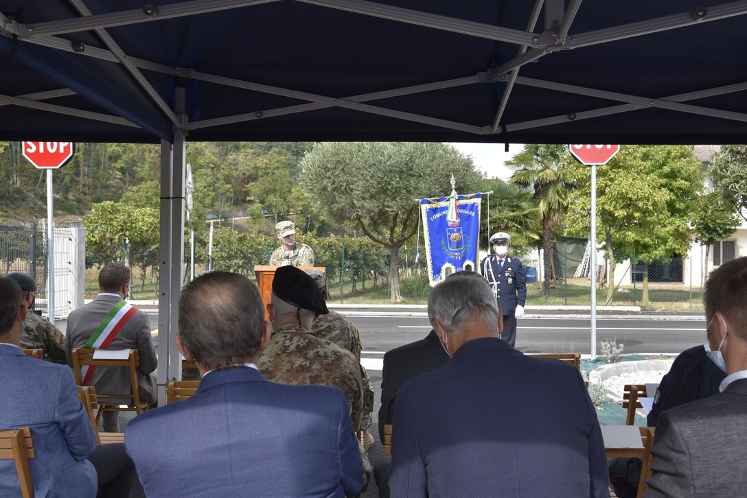 U.S. Army Corps of Engineers, Europe District Commander Col. Pat Dagon speaks in front of local officials, community members and U.S. and Italian military personnel at a ribbon cutting ceremony celebrating the completion of the Via Martinelli road improvement project just outside the Longare military installation on October 4, 2021. The U.S. Army Corps of Engineers, Europe District is managing a $30 million construction and renovation program primarily funded by U.S. Army Intelligence and Security Command, U.S. Africa Command and U.S. Army Southern European Task Force, Africa to provide the 207th MIB(T) improved facilities at the Longare and Caserma Ederle portions of U.S. Army Garrison Italy. (U.S. Army photo by Chris Gardner)