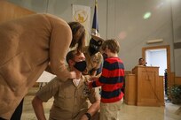 211119-N-GW139-1114 NAVAL SUPPORT ACTIVITY NAPLES, Italy (Nov. 19, 2021) Chief Operations Specialist Casey Jacobs, center, is pinned to the rank of Chief Petty Officer during a pinning ceremony onboard U.S. Naval Support Activity Naples (NSA), Nov. 19, 2021. NSA Naples is an operational ashore base that enable U.S., allied, and partner nation forces to be where they are needed, when they are needed to ensure security and stability in Europe, Africa, and Southwest Asia. (U.S. Navy Photo by Mass Communication Specialist 1st Class Eric Coffer)