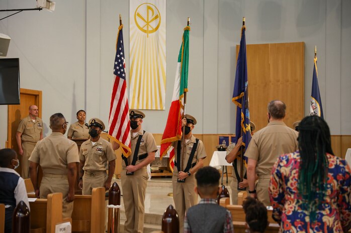 211119-N-UN585-1010 NAVAL SUPPORT ACTIVITY NAPLES, Italy (Nov. 19, 2021) The color guard parades the colors during a Chief Petty Officer pinning ceremony onboard U.S. Naval Support Activity Naples (NSA), Nov. 19, 2021. NSA Naples is an operational ashore base that enable U.S., allied, and partner nation forces to be where they are needed, when they are needed to ensure security and stability in Europe, Africa, and Southwest Asia. (U.S. Navy Photo by Mass Communication Specialist 2nd Class Claire Dubois)