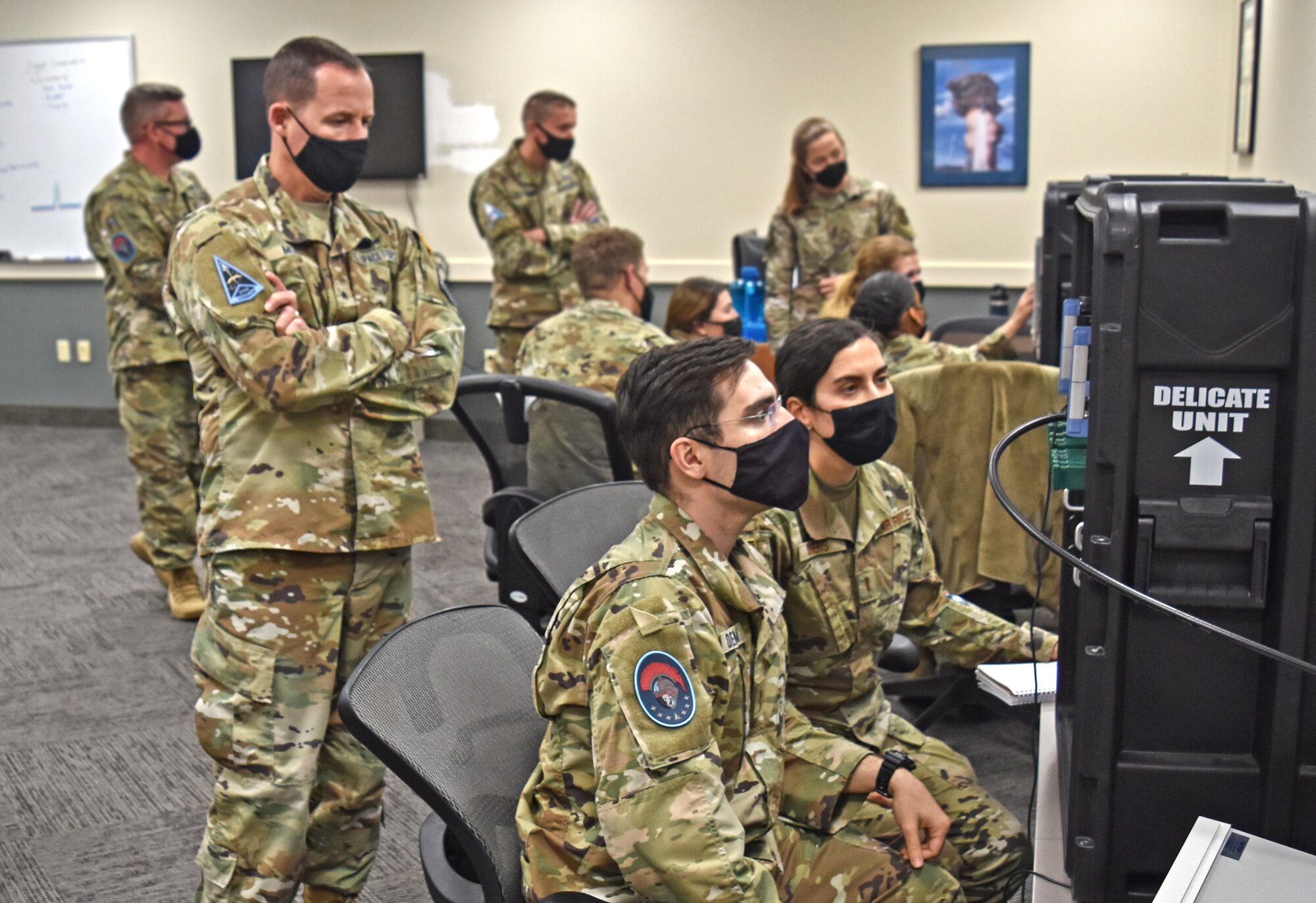 Space Training and Readiness Command (STARCOM) hosted its first commander’s conference at various locations on Vandenberg SFB, Nov. 3-5. Brig. Gen. Todd Moore, STARCOM Deputy Commander, watches as students from the 533rd Training Squadron demonstrate what they've learned while in training.