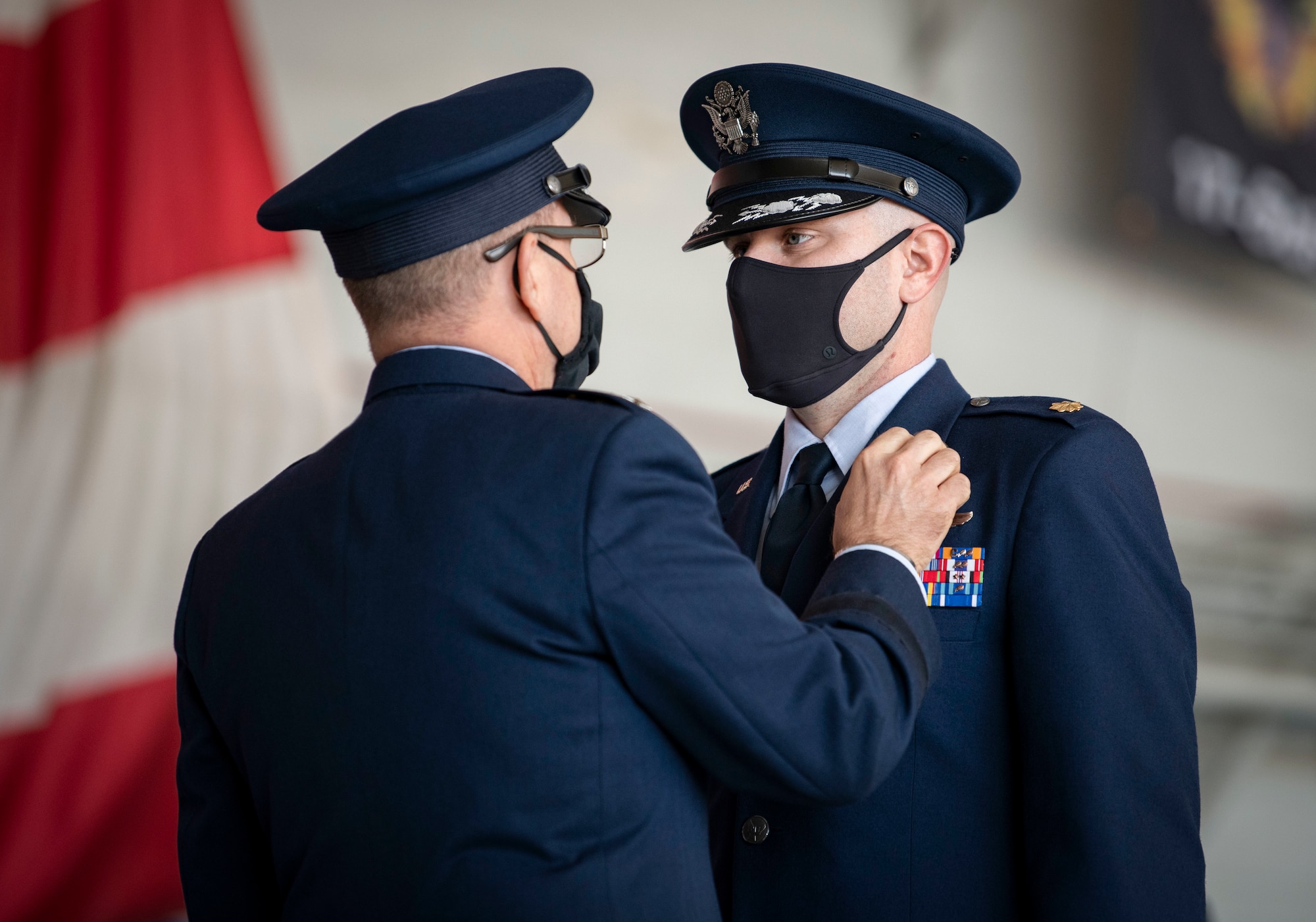 U.S. Air Force Maj. Christopher B. Summerlin, 15th Expeditionary Special Operations Squadron MC-130H Combat Talon II aircraft commander, receives a Distinguished Flying Cross during a DFC presentation ceremony at Hurlburt Field, Florida, Nov. 8, 2021.