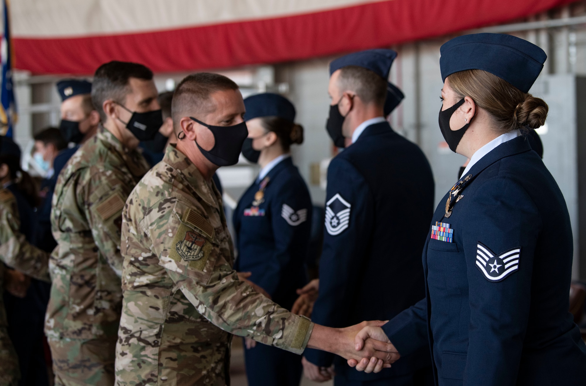 Single Event Air Medal recipients are congratulated after a medal presentation ceremony at Hurlburt Field, Florida, Nov. 8, 2021.