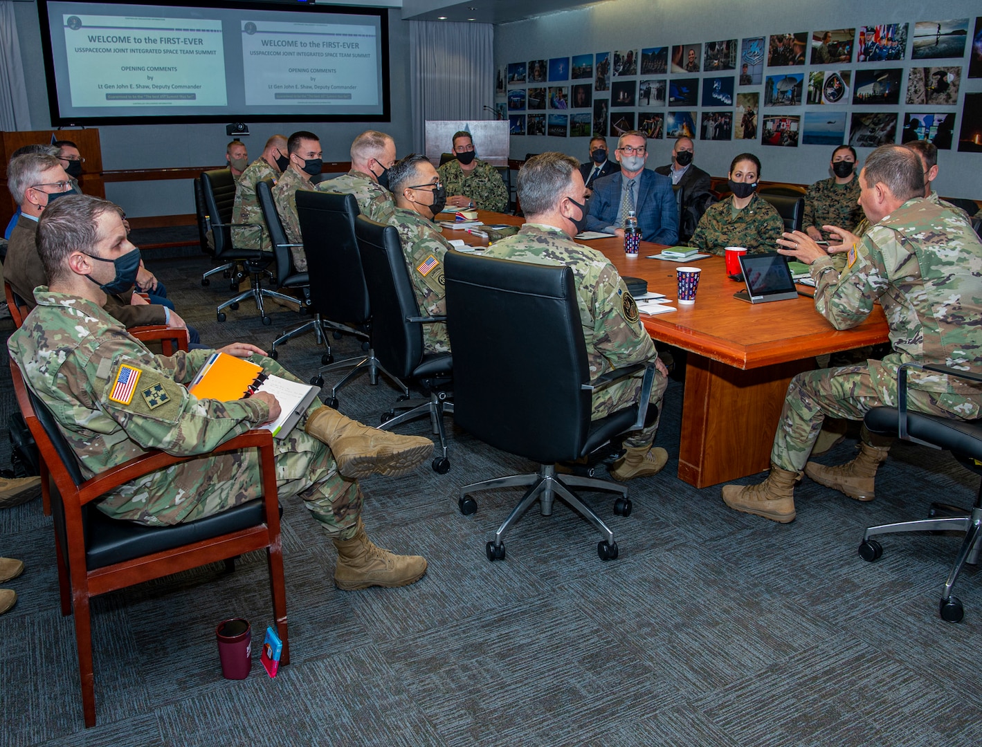 U.S. Space Force general speaks with U.S. Space Command service members.