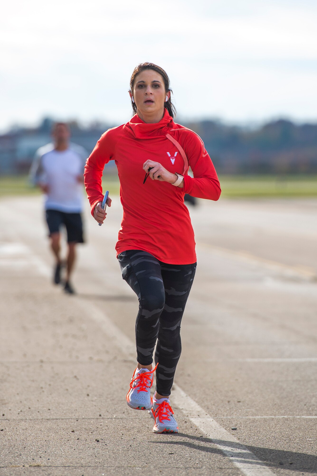 Runners push through the final stretch of the 88th Force Support Squadron’s Turkey Trot 5k Fun Run, Nov. 18, 2021, at Wright-Patterson Air Force Base, Ohio. Due to COVID, runners were released in waves of 10 this year to help with social distancing. (U.S. Air Force photo by Wesley Farnsworth)