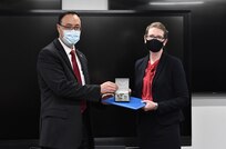 IMAGE: Naval Surface Warfare Center Dahlgren Division Dam Neck Activity System Safety Practitioner Dana Sevier is presented with her Civilian Service Achievement Medal (CSAM) by her division head James Yee. The CSAM is awarded to Department of the Navy and Marine Corps civilians for exceptional sustained performance or a specific outstanding achievement.