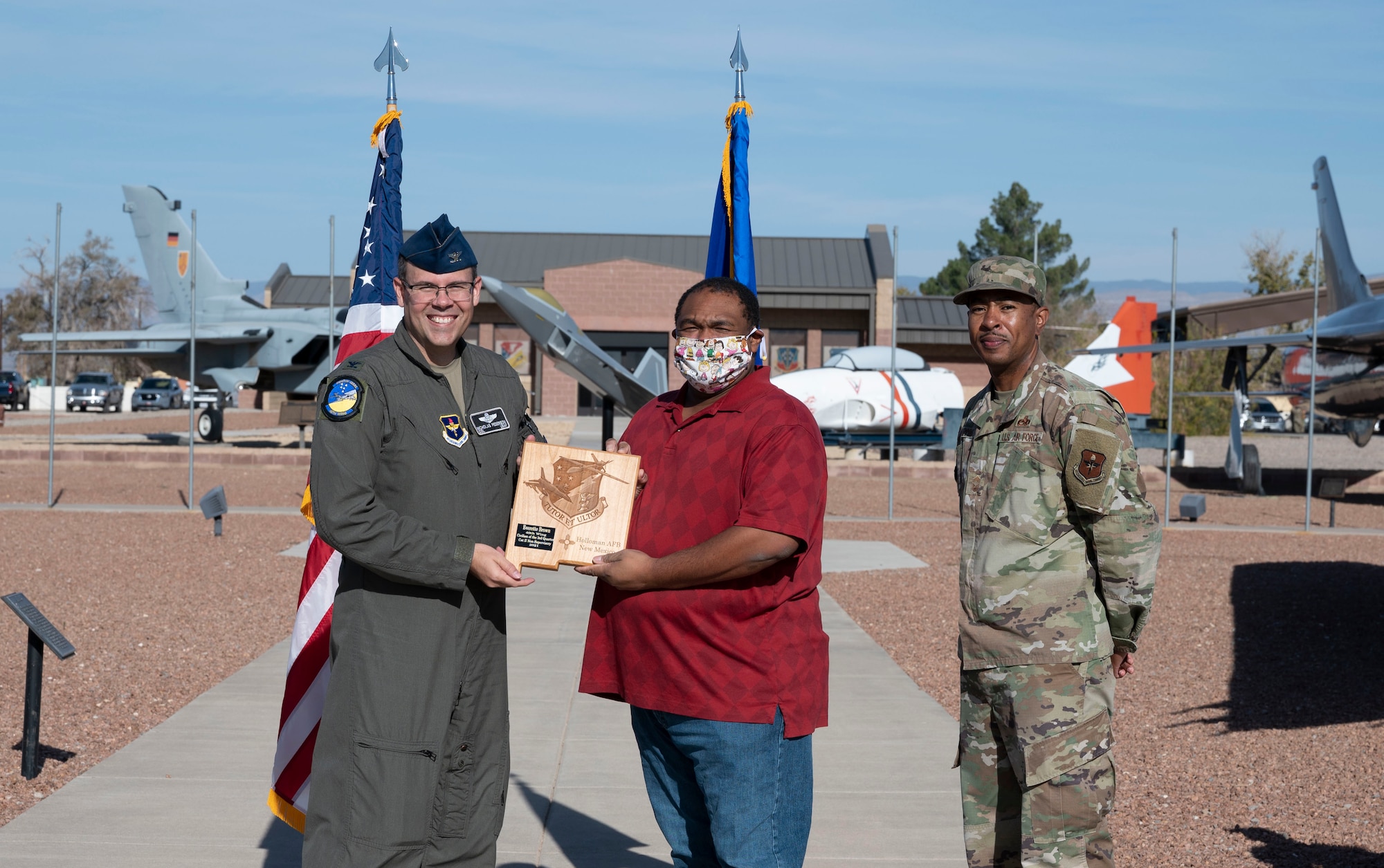 Everette Brown, quarterly award winner, accepts the Civilian Category II Non-Supervisory of the quarter award during the 49th Wing’s 3rd quarter award ceremony, Nov. 19, 2021, on Holloman Air Force Base, New Mexico. Quarterly award winners were selected based on their technical expertise, demonstration of leadership and job performance. (U.S. Air Force photo by Airman 1st Class Antonio Salfran)