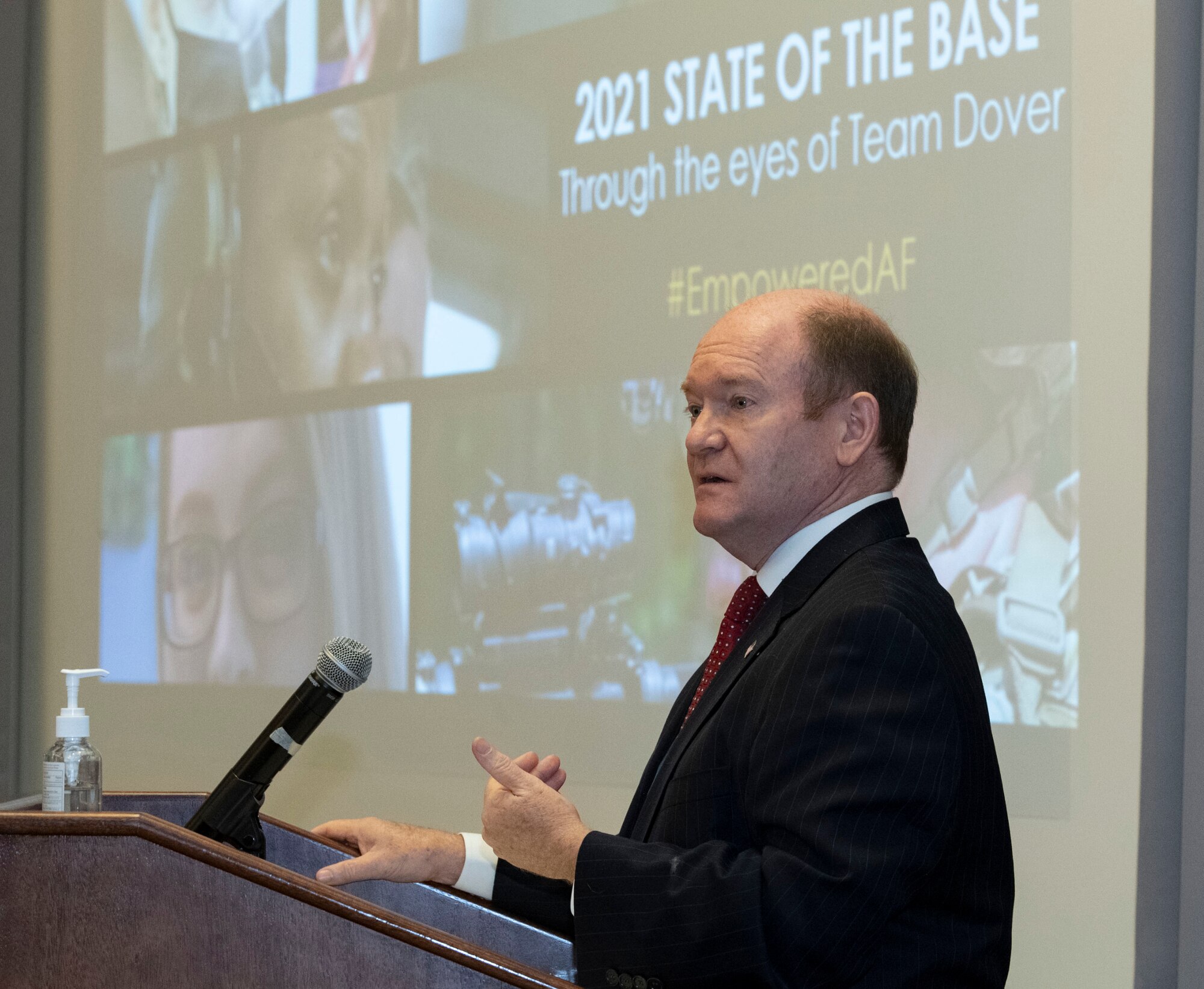 U.S. Sen. Chris Coons, addresses U.S. congressional delegates from Delaware, Central Delaware Chamber of Commerce members, local civic and business leaders and Team Dover members at the 2021 State of the Base briefing on Dover Air Force Base, Delaware, Nov. 22, 2021. The event was hosted by the Central Delaware Chamber of Commerce and provided an opportunity to educate and inform community members and leaders on how the Dover community ties into the base's mission, vision and priorities. (U.S. Air Force photo by Roland Balik)