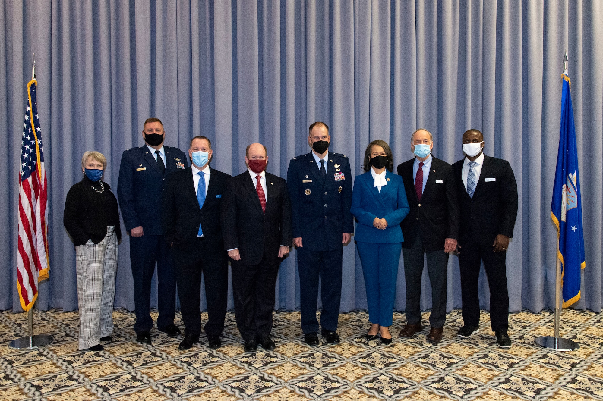 Col. Doug Stouffer, 512th Airlift Wing commander, second from left, and Col. Matt Husemann, 436th AW commander, center, stand with U.S. congressional delegates from Delaware as well as Central Delaware Chamber of Commerce members, at the 2021 State of the Base briefing on Dover Air Force Base, Delaware, Nov. 22, 2021. The event was hosted by the CDCC and informed attendees on community partnership initiatives and the impact that Team Dover has on the state and local economies. (U.S. Air Force photo by Roland Balik)