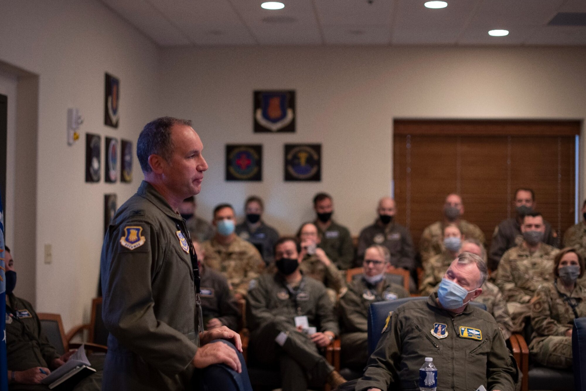 Col. Nate Vogel, 22nd Air Refueling Wing commander, greets the KC-46A Pegasus Weapons Systems Council as the host and begins discussions regarding the future of the multi-role tanker aircraft Nov. 17, 2021, at McConnell Air Force Base, Kansas. The 22nd ARW hosted attendees from more than 11 unites across the Total Force including aircrews from Altus AFB, Oklahoma, and Pease Air National Guard Base, N.H. (U.S. Air Force photo by Senior Airman Marc A. Garcia)