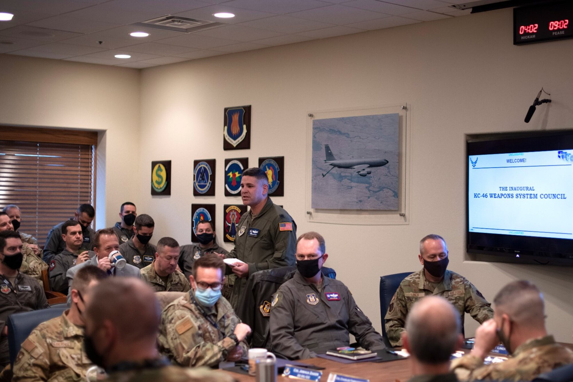 Lt. Col. Joshua Moores, 344th Air Refueling Squadron commander, leads a discussion regarding the agenda of the KC-46A Pegasus Weapons Systems Council Nov. 17, 2021, at McConnell Air Force Base, Kansas. The 22nd Air Refueling Wing hosted the council to discuss strategic perspective and future opportunities with the next-generation aircraft. (U.S. Air Force photo by Senior Airman Marc A. Garcia)