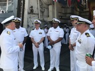 Vice Adm. Gene Black, Commander, U.S Sixth Fleet, left, speaks with chaplains assigned to Destroyer Squadron (DESRON) 60 during the DESRON 60 change of command in Rota, Spain, Aug. 10, 2021.