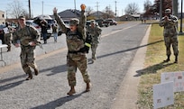 Soldiers, civilians and families of 83rd ARRTC deliver fun, food at 3rd annual holiday ruck march