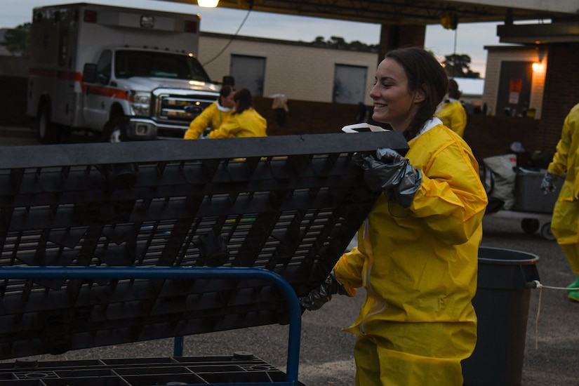 An Airman assigned to the 628th Medical Group learns to assemble a decontamination station during a training exercise at Joint Base Charleston, S.C., Nov. 4, 2021.