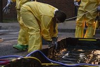 An Airman assigned to the 628th Medical Group assembles a decontamination station during a training exercise at Joint Base Charleston, S.C., Nov. 4, 2021.