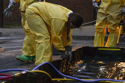 An Airman assigned to the 628th Medical Group assembles a decontamination station during a training exercise at Joint Base Charleston, S.C., Nov. 4, 2021.