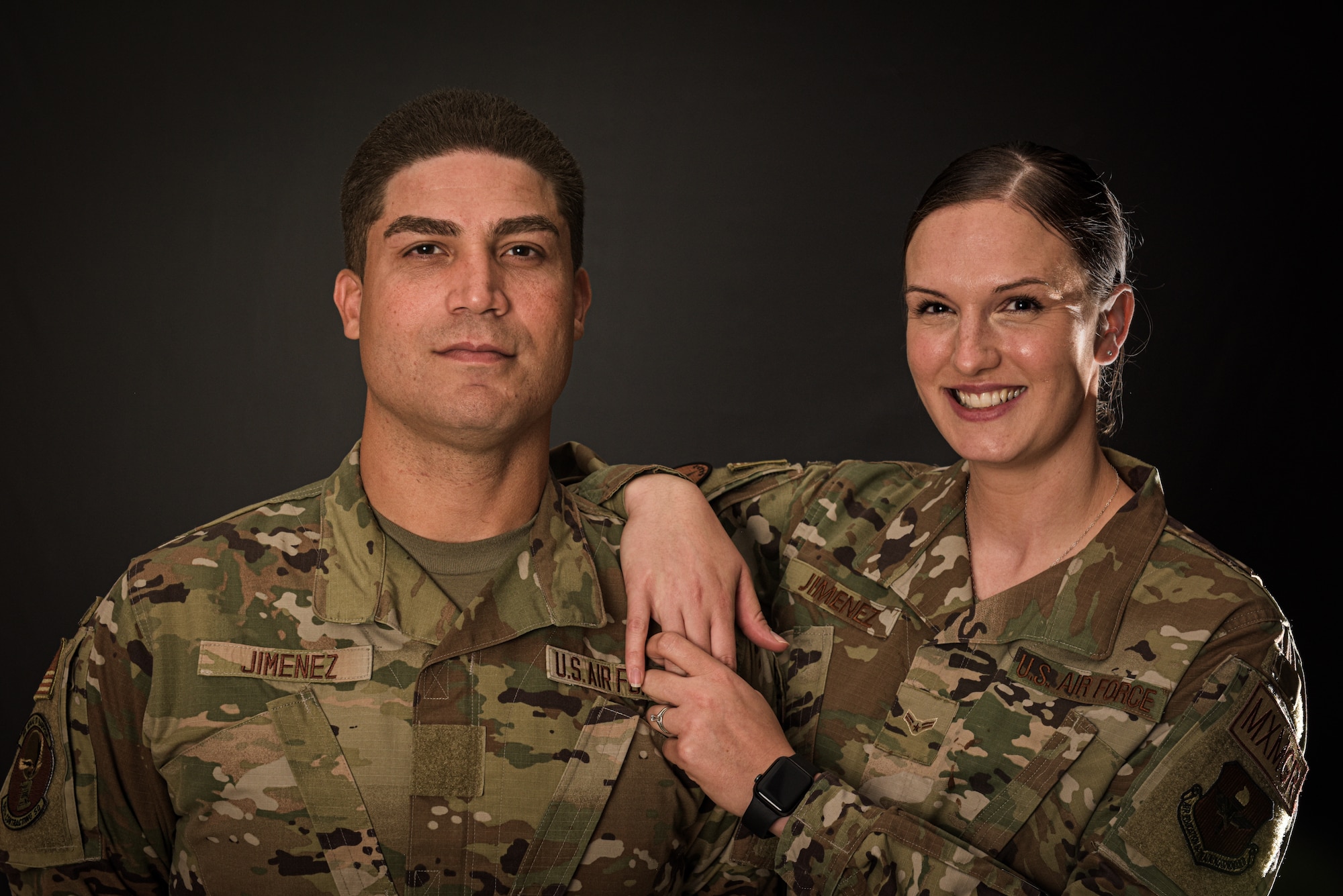 U.S. Air Force Airman Basic Richard Jimenez, 56th Contracting Squadron contract specialist, and his wife, U.S. Air Force Airman 1st Class Jenna Jimenez, 308th Aircraft Maintenance Unit analyst, pose together Nov. 5, 2021, at Luke Air Force Base, Arizona.
