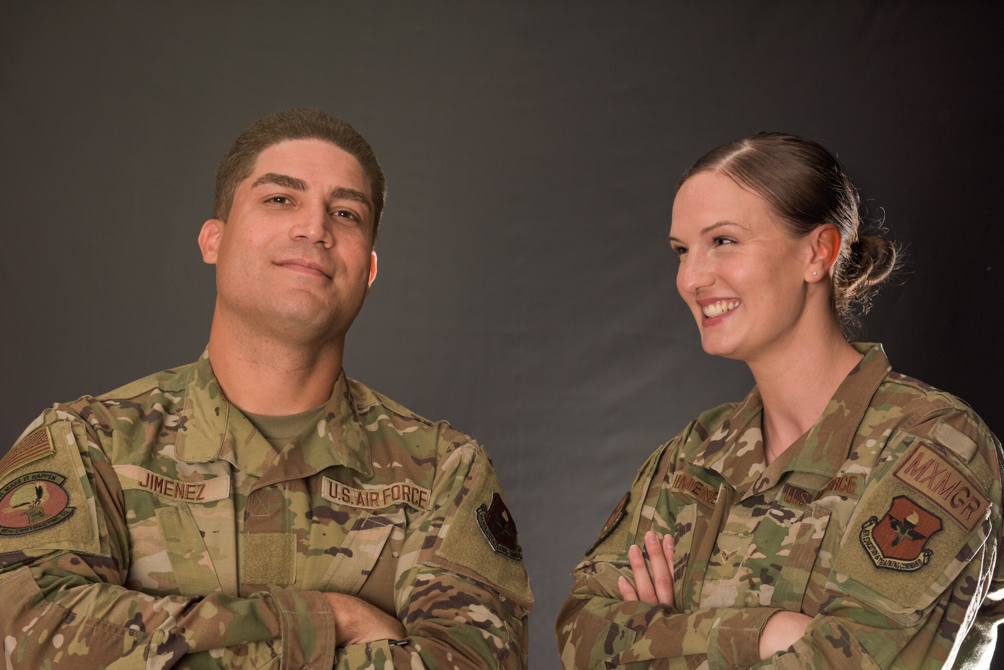 U.S. Air Force Airman Basic Richard Jimenez, 56th Contracting Squadron contract specialist, and his wife, U.S. Air Force Airman 1st Class Jenna Jimenez, 308th Aircraft Maintenance Unit analyst, pose together Nov. 5, 2021, at Luke Air Force Base, Arizona.