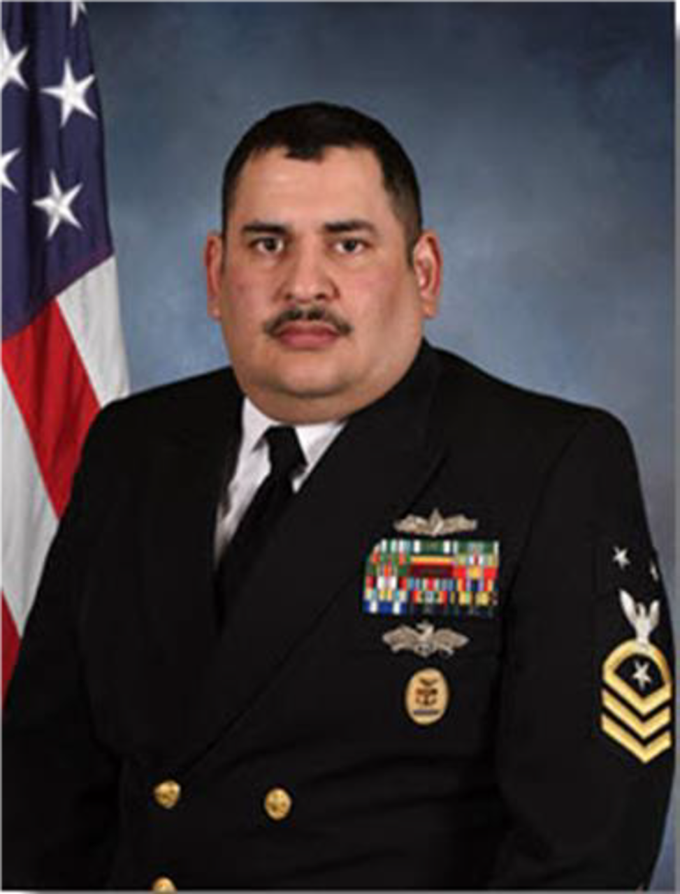 Official studio portrait of Command Master Chief Juan M. Navarro, Jr.