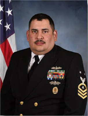 Official studio portrait of Command Master Chief Juan M. Navarro, Jr.