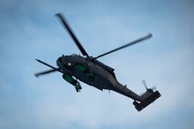 A U.S. Air Force HH-60G Pavehawk helicopter assigned to the Alaska National Guard hovers over Eielson Air Force Base, Alaska during a recovery exercise, Nov. 18, 2021.