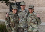 From left, U.S. Air Force Master Sgt. Lindsay Foster, 144th Maintenance Squadron unit deployment manager, Chief Master Sgt. Diana Foster, 144th Force Support Squadron superintendent, and Master Sgt. Elida Foster, 144th Medical Group dental assistant, at the Fresno Air National Guard Base, Calif., Nov. 5, 2021. The Foster sisters have served at the 144th Fighter Wing since 2008.