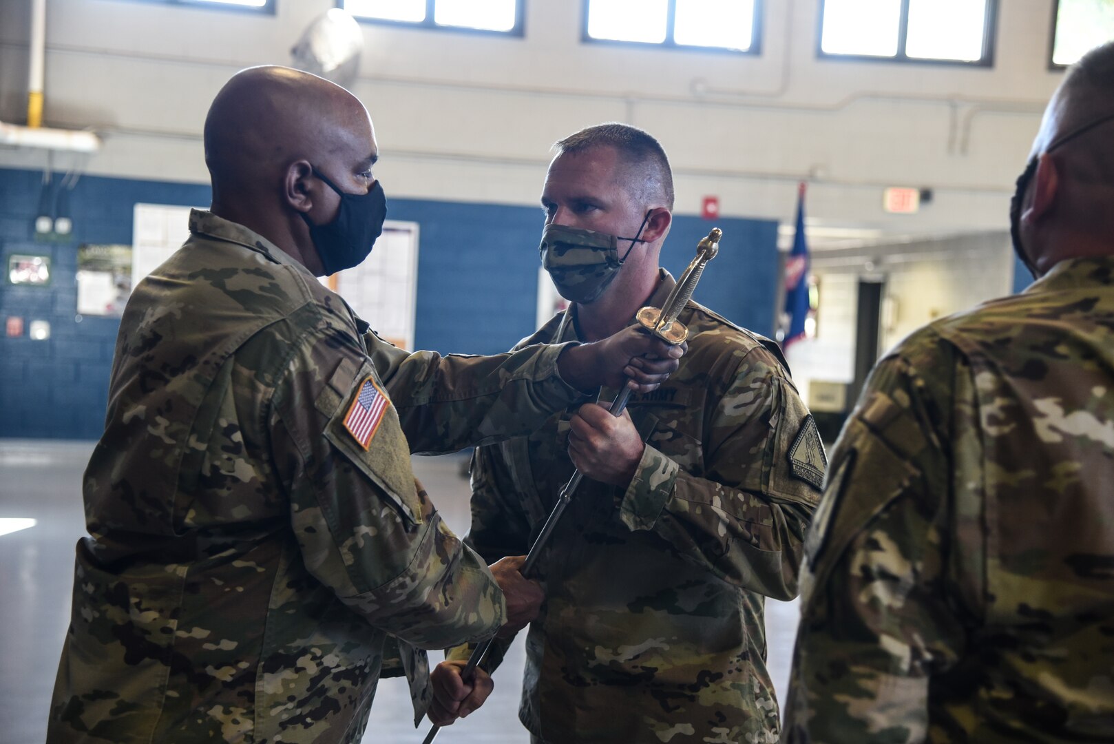 Soldiers assigned to Alpha Company of the Virginia National Guard’s Recruiting and Retention Battalion welcomed a new first sergeant and commander in a ceremony held Oct. 20, 2021 at the armory in South Boston, Virginia. Capt. Michael Eames took command of the company from Capt. Keith Agee, and 1st Sgt. Michael Clay took responsibility of the formation from 1st Sgt. Donnie Brizendine, who recruited Clay into the National Guard 17 years ago. (U.S. Army National Guard photo by Sgt. 1st Class Terra C. Gatti)