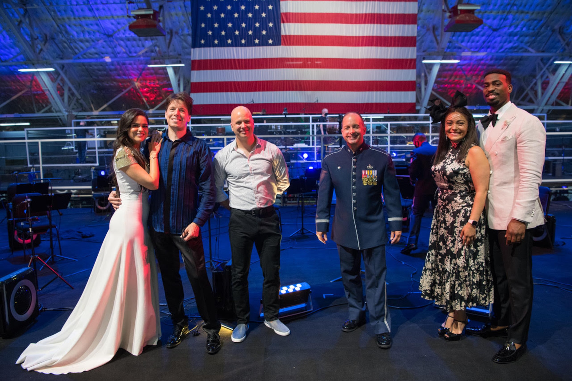 Master Sgt. Jeremy Koch (third from left) acts as guest artist relations manager following the 2020 Fourth of July livestream event at Joint Base Andrews. Pictured left to right are soprano Larissa Martinez, violinist Joshua Bell, Master Sgt. Jeremy Koch, Colonel Don Schofield, and bass Solomon Howard. (U.S. Air Force photo by Chief Master Sgt. Kevin Burns)