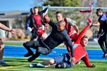 U.S. Space Command and Joint Task Force-Space Defense team members play flag football during inaugural Space Turkey Bowl.